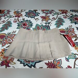 Beige pleated skirt New 4inch long from Mandees